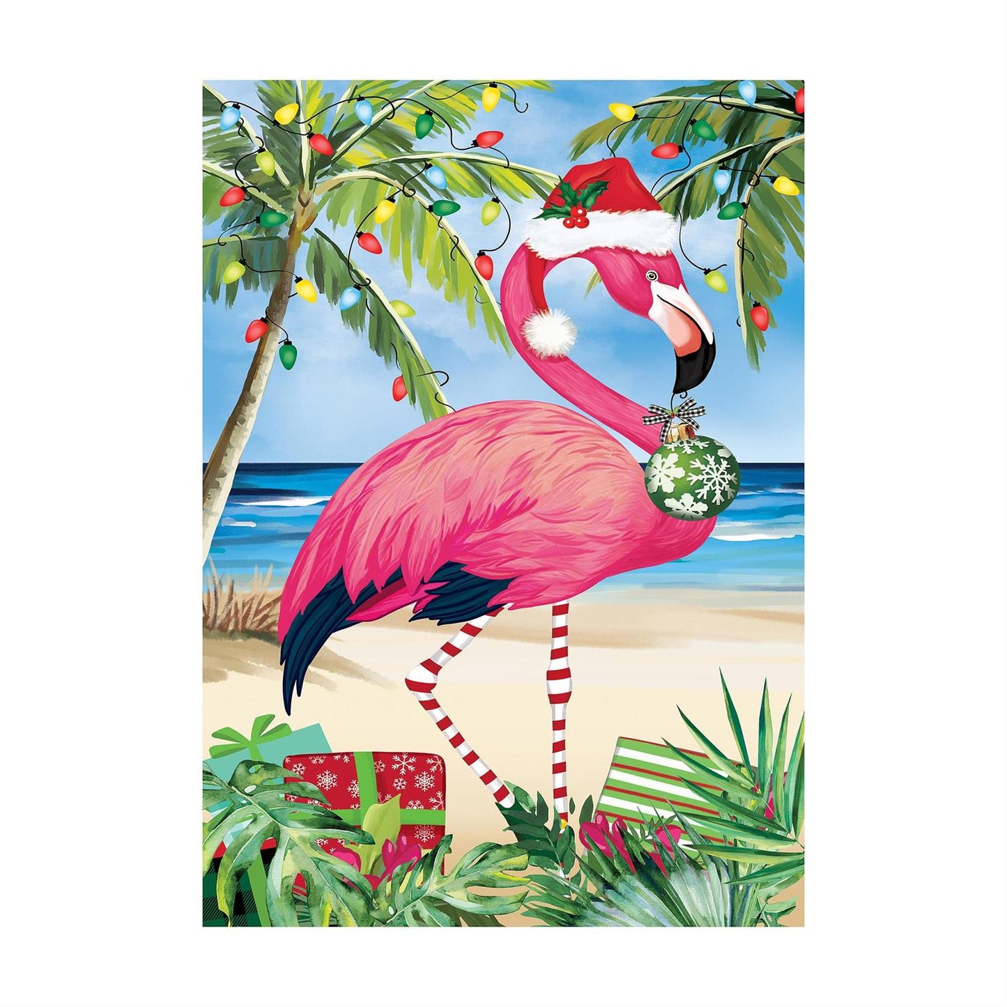Flamingo in Santa hat with Christmas decorations on a tropical beach scene