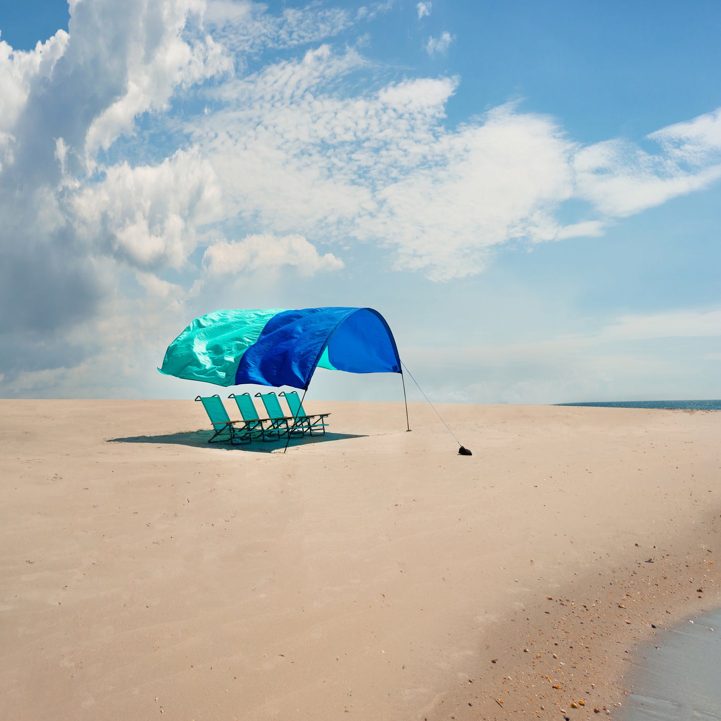 Classic Shibumi Shade® with Quiet™ Canopy + Wind Assist Bundle - Blue and Teal