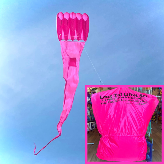 Pink kite with long tail against a blue sky, inset showing kite packaging.