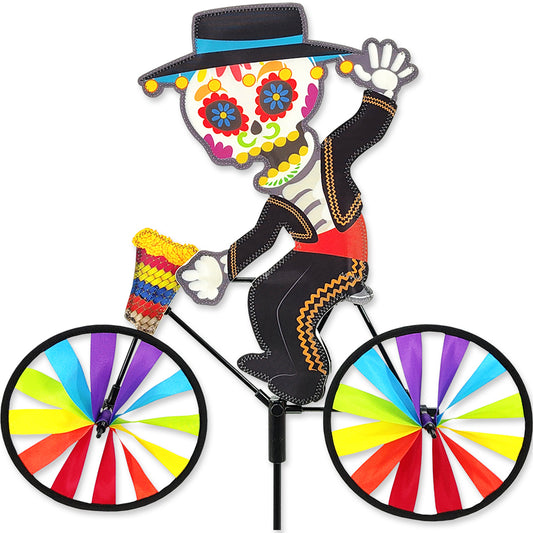 Colorful bicycle spinner with a decorative figure on a white background