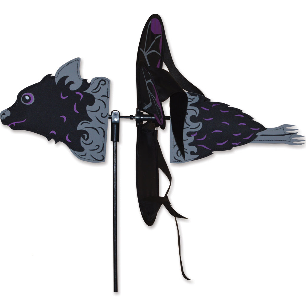 Bat-shaped windmill on a white background