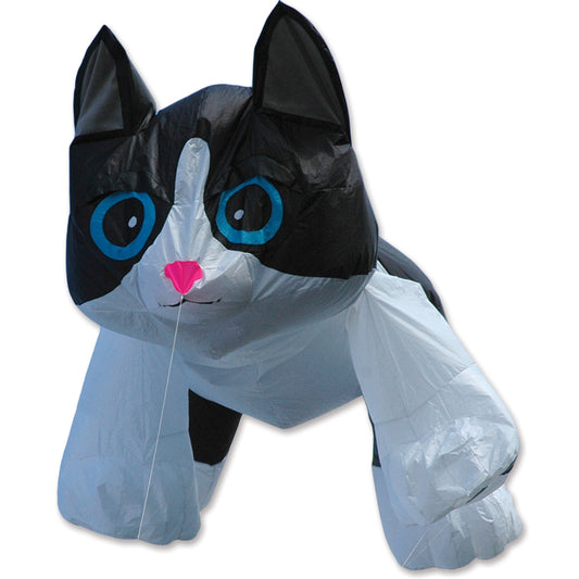 A black and white cat-shaped inflatable kite with bright blue eyes and a pink nose, shown against a plain white background.