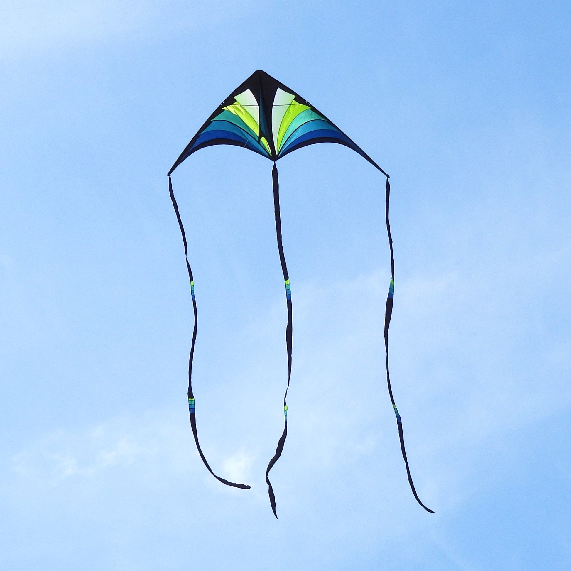 Colorful kite against a clear blue sky