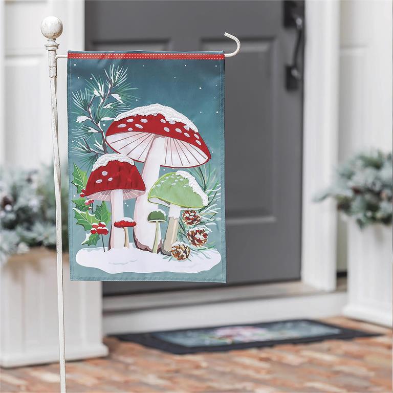 Decorative garden flag with mushrooms on a stand in front of a door.
