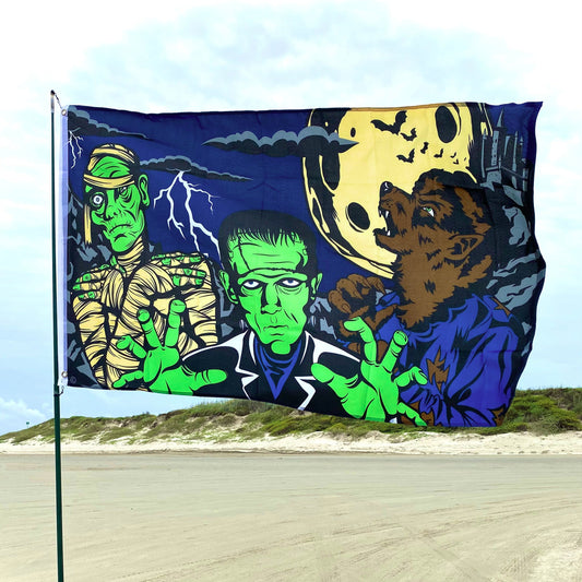 Flag with horror movie characters design on a beach