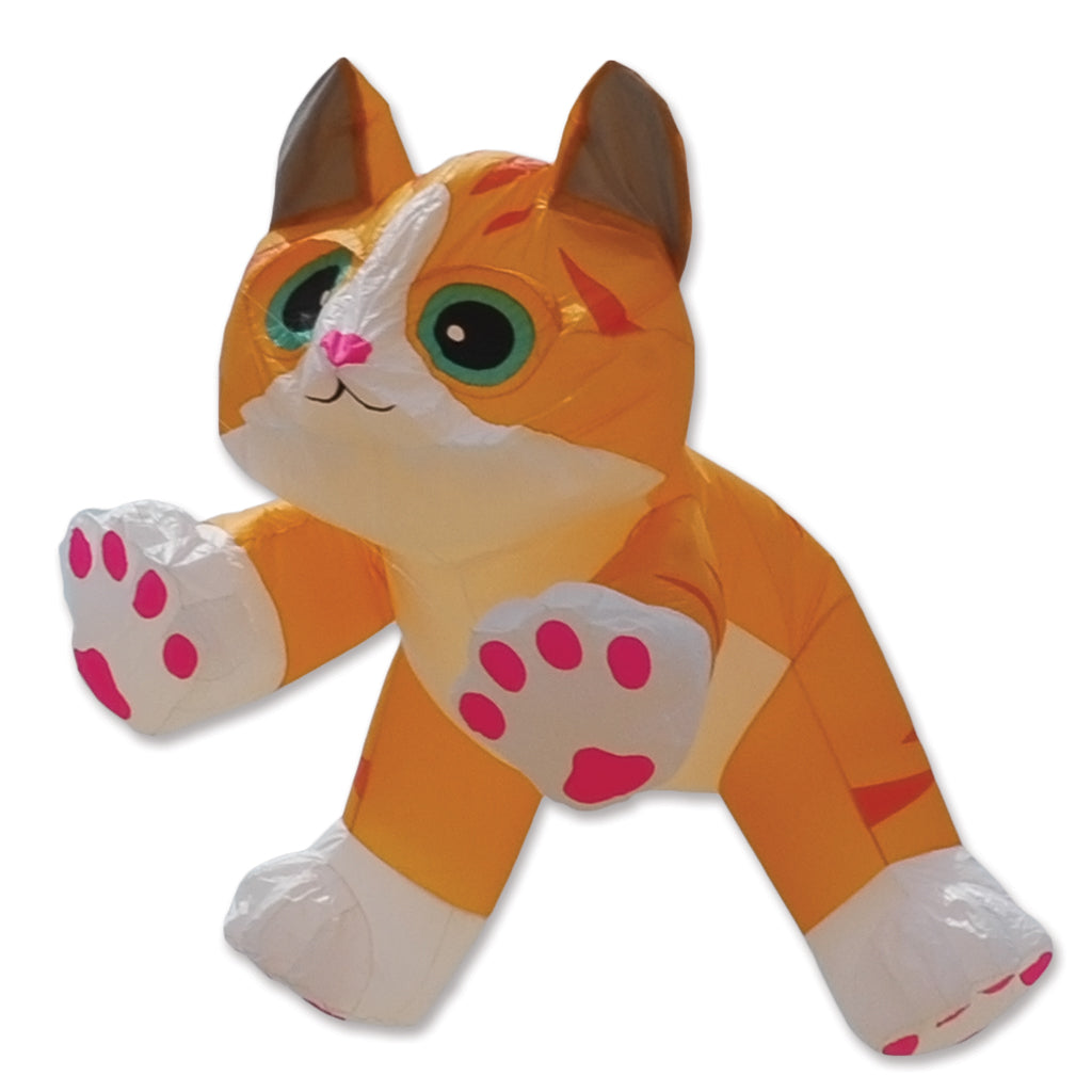 An inflatable orange and white cat-shaped kite, shown against a plain white background.
