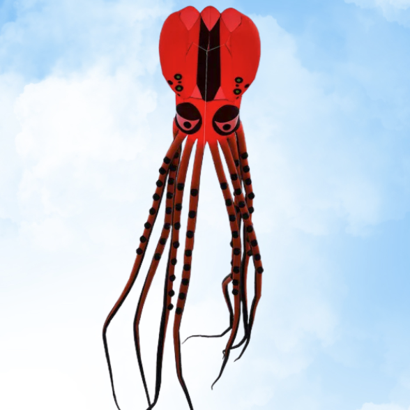 Orange and black squid-shaped kite against a blue sky with white clouds