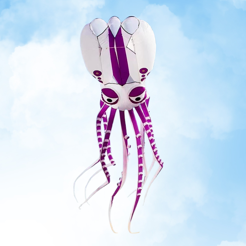 Purple and white octopus or squid-shaped kite against a blue sky with clouds