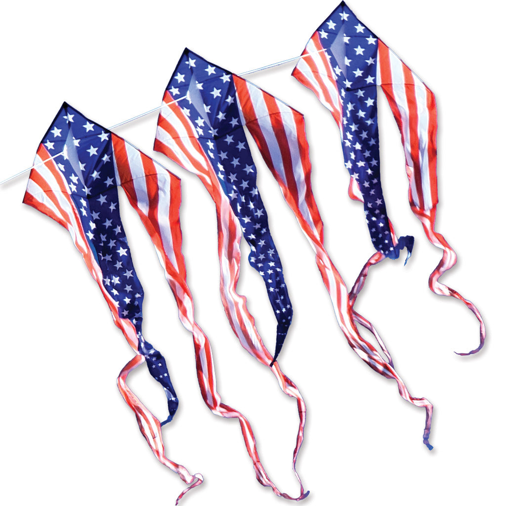 Three American flag kites with long tails on a white background