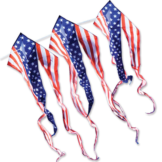 Three American flag kites with long tails on a white background