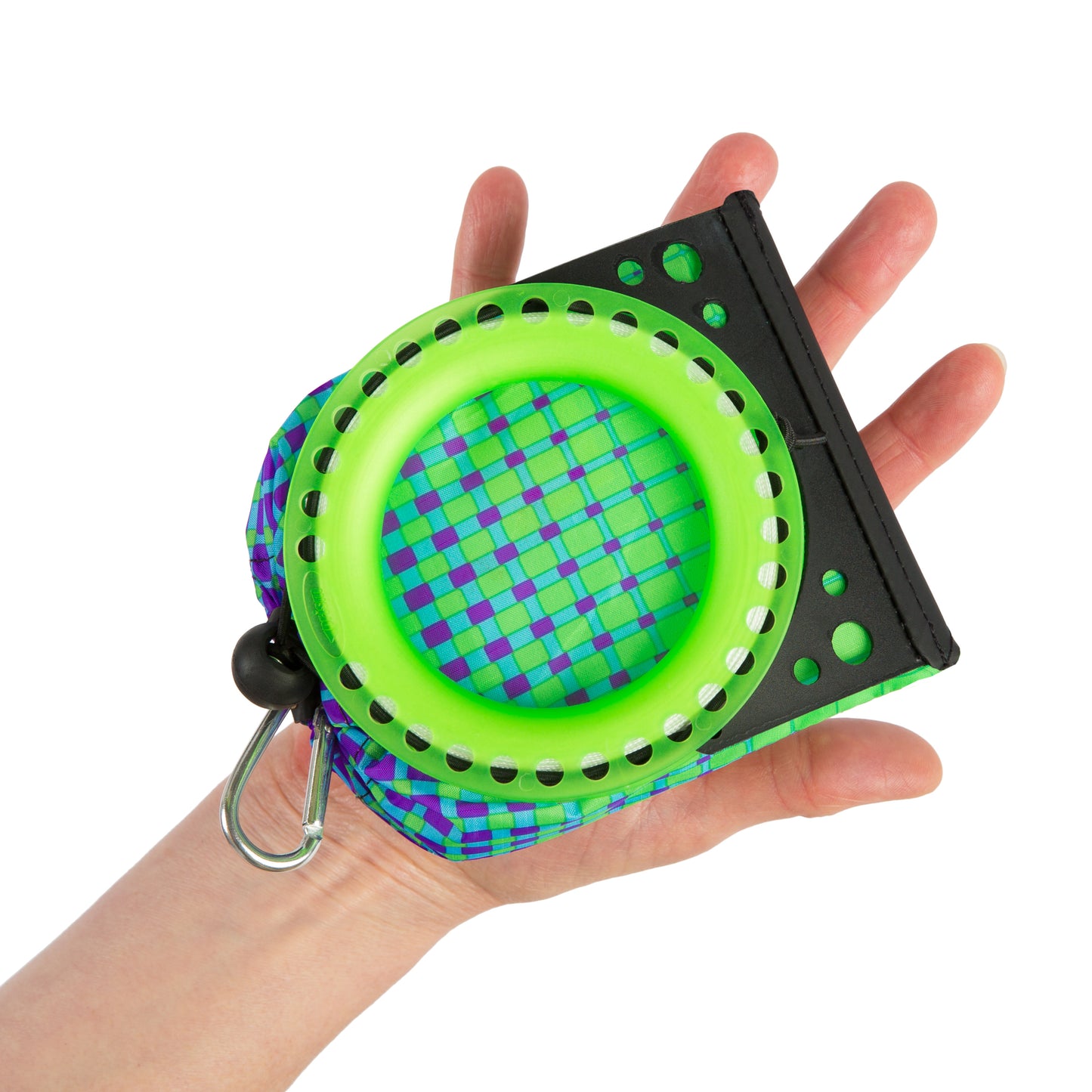 Green and purple kite with a carabiner held in a hand on a white background